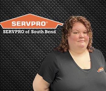 smiling woman with SERVPRO logo above her head